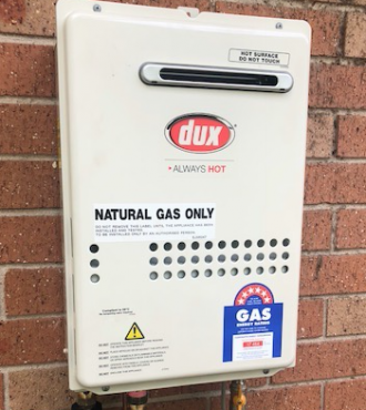 dux gas hot water system installed on house